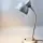 Kaiser Idell 6556 Tischlampe, perlsandgestrahlt und klar lackiert, ohne Prägung. Charaktervolles Vintage-Original von Christian Dell für Sammlerfreunde.